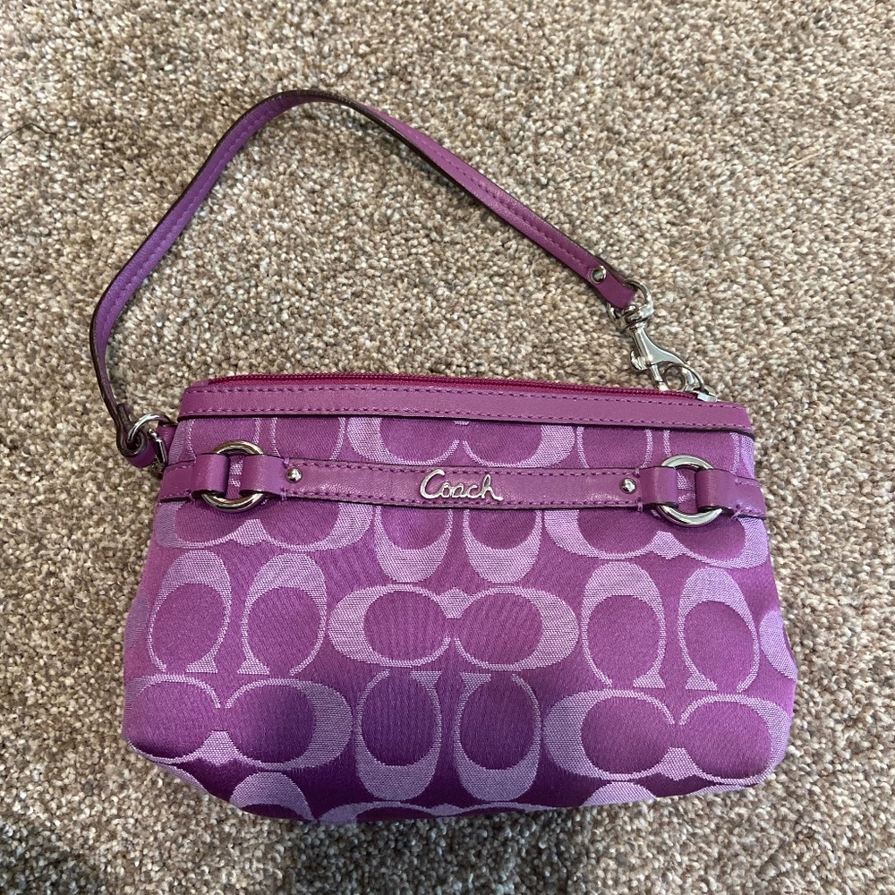 Small purple Coach wristlet